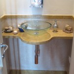 bagno zona giorno con rubinetto a cascata